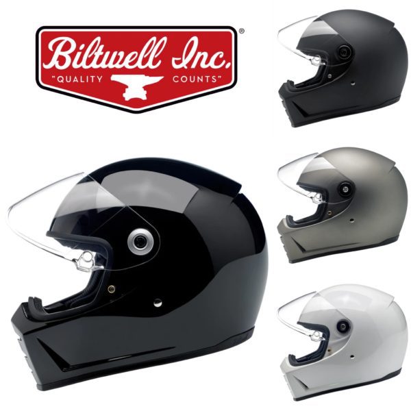 Variety of Biltwell Inc. motorcycle helmets in black, grey, and white with clear visors.