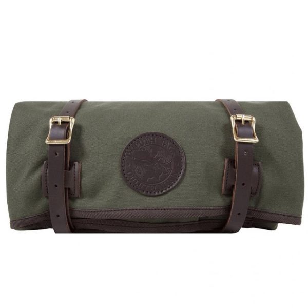 Green canvas duffel bag with brown leather straps and emblem detail.